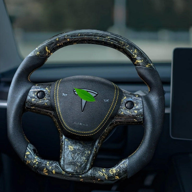 Tesla Model 3/Y 24 Karat Steering Wheel - Forged Carbon with Gold Flakes and Alcantara Main image
